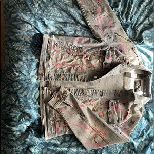 I’m selling a painted jean jacket, size L.